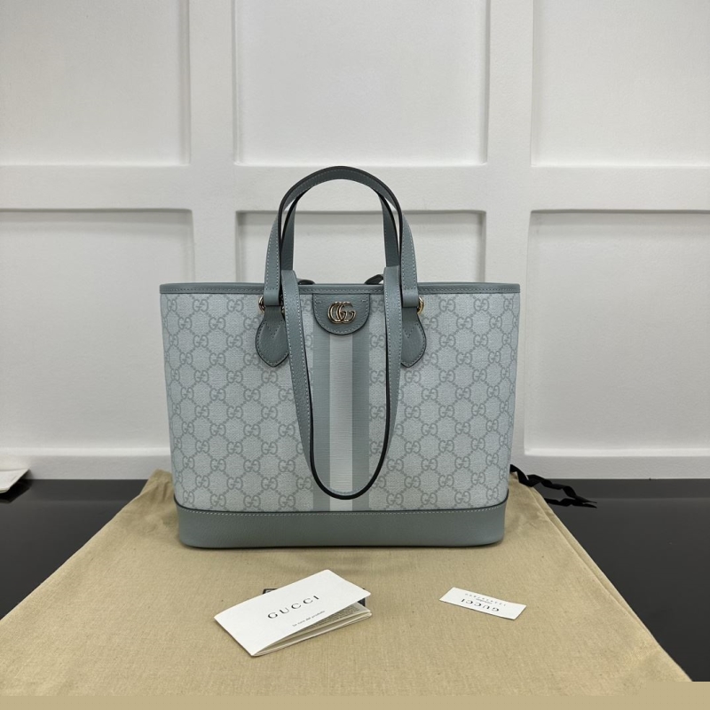 G*u*i shopping bags